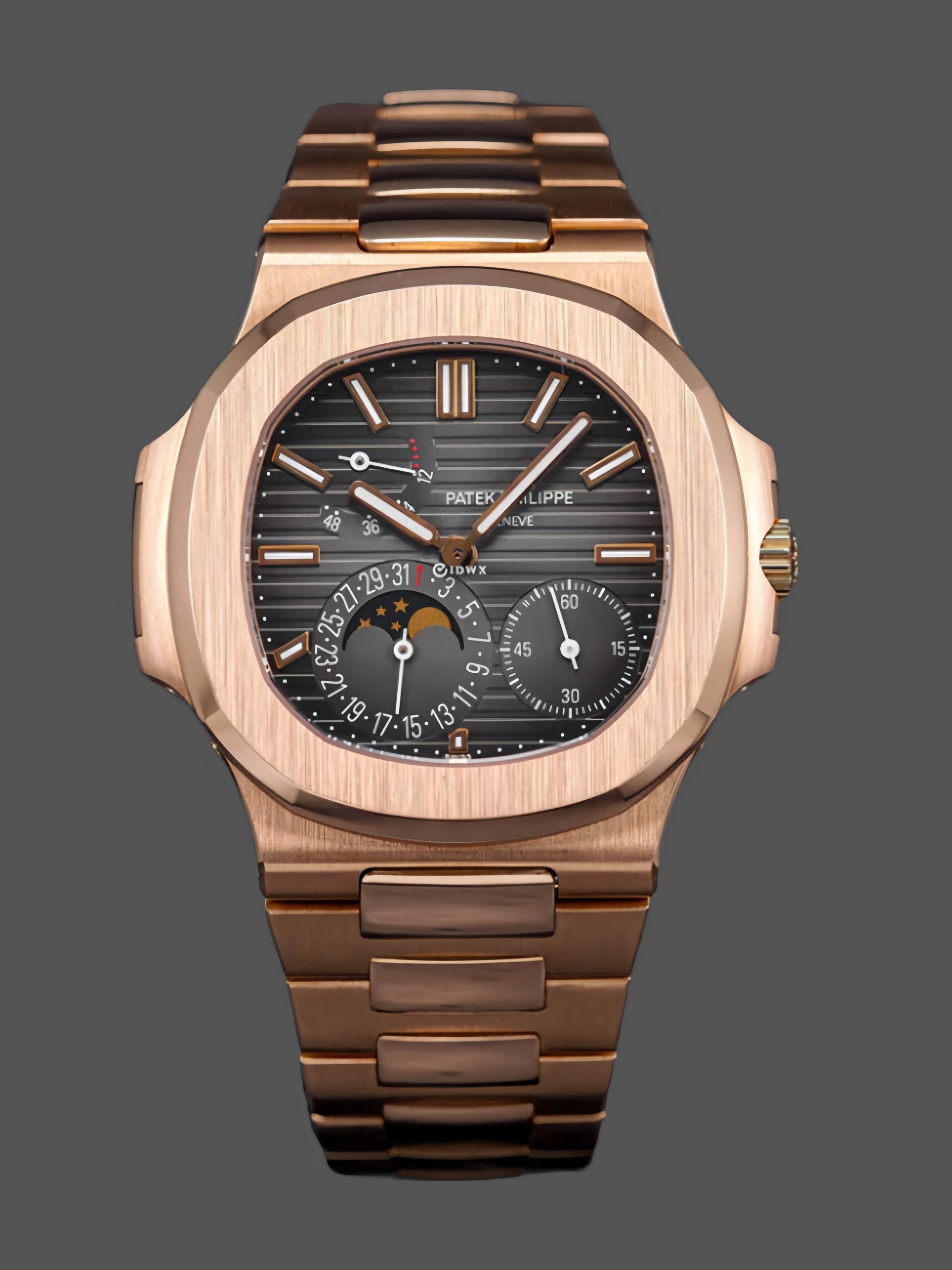 5BF2E3EF-6984-1AE9-1651-70387AEE2E6B Patek Philippe Nautilus Moon Phase Rose Gold Black Dial 5712 1R 001 40MM - Image 1