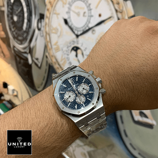 AP Royal Oak Chronograph 26331ST Supreme Clone Quality audemars piguet royal oak blue dial 26331ST.OO .1220ST Audemars Piguet Stainless Steel Blue Dial Replica on the man wrist watch background